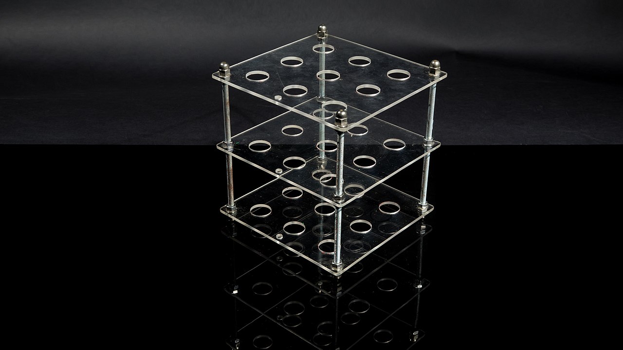 Three-dimensional tic-tac-toe can be played on three arrays of 3x3